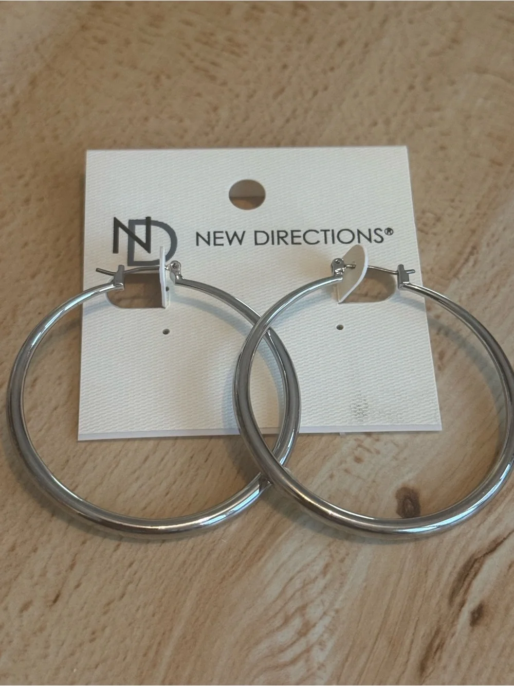 NWT. New Directions. Medium Silver Hoop Earrings.